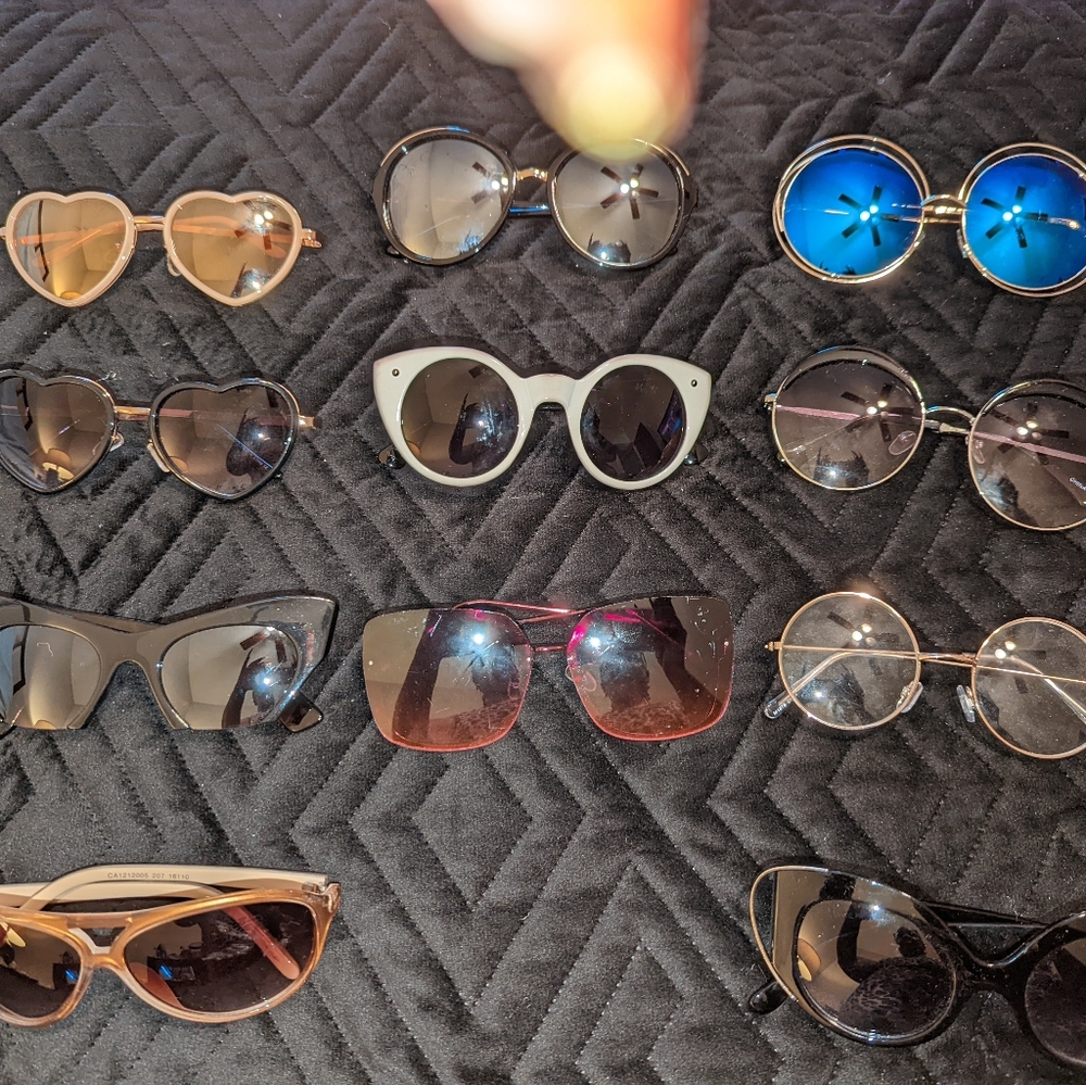 Various new and used sunglasses